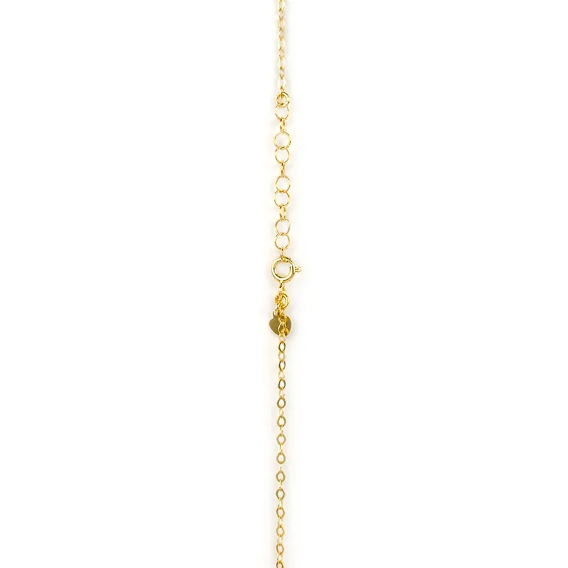 Collana in oro giallo con pendente di topazio azzurro
