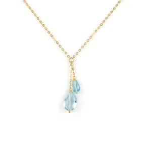 Collana in oro giallo con pendente di topazio azzurro