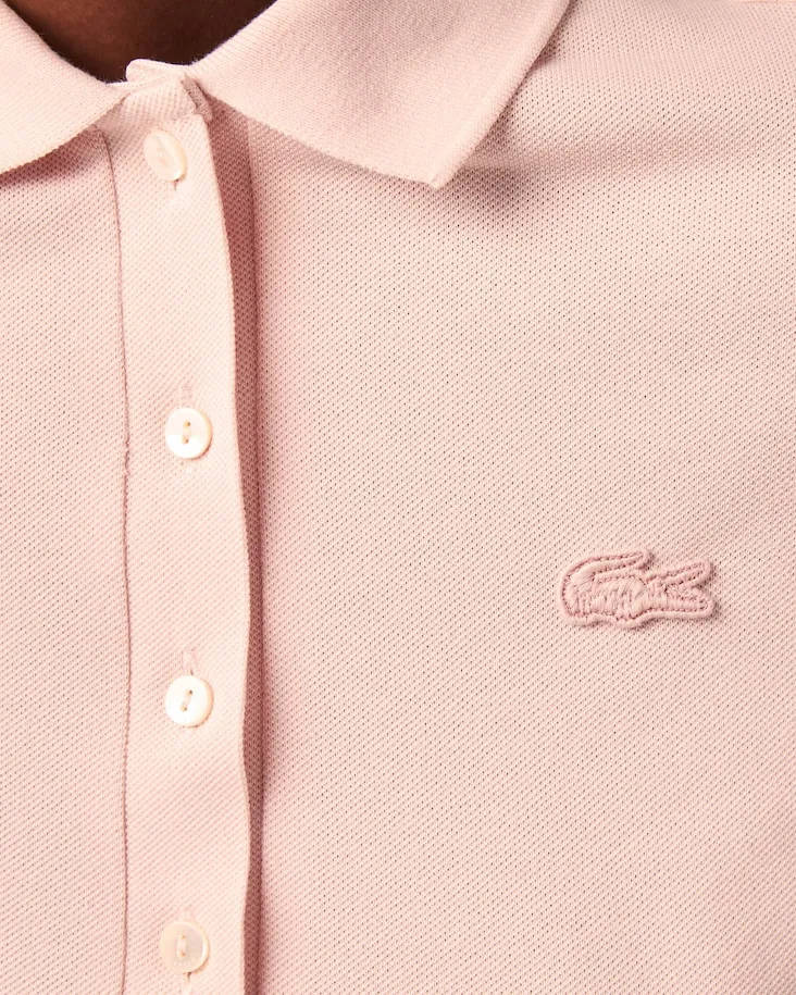 Polo slim fit rosa in piquet di cotone stretch con mini logo ricamato tono su tono